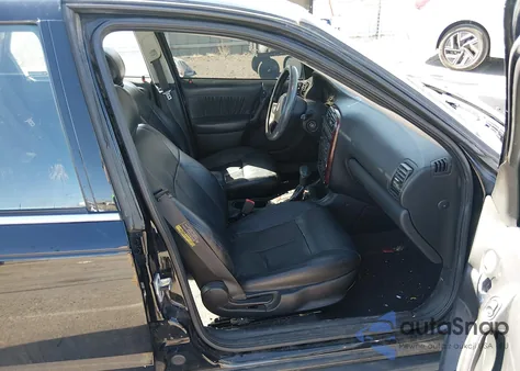 2002 Saturn L-Series L300 из США, поврежденный, VIN 1G8JW54R12Y581015